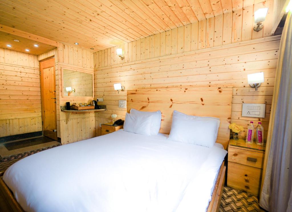 Postel nebo postele na pokoji v ubytování Hotel Mirage