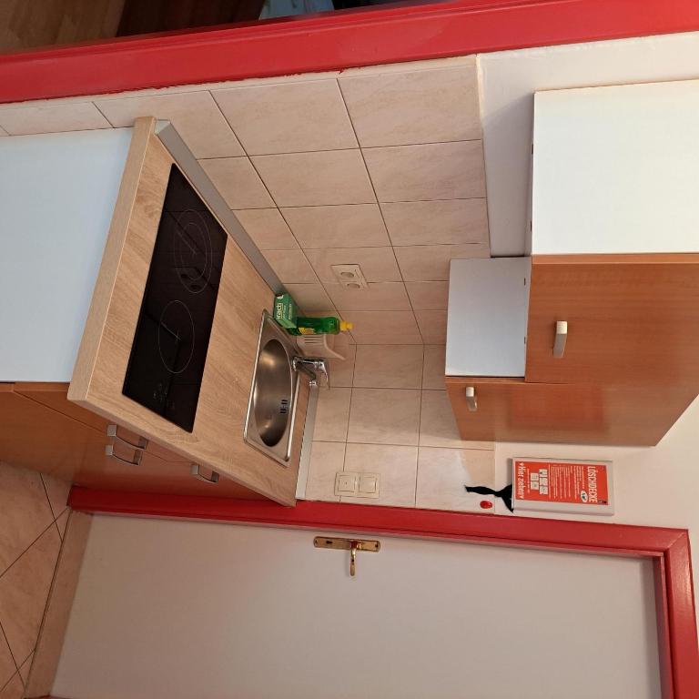 Kuchyňa alebo kuchynka v ubytovaní Apartments Tomic