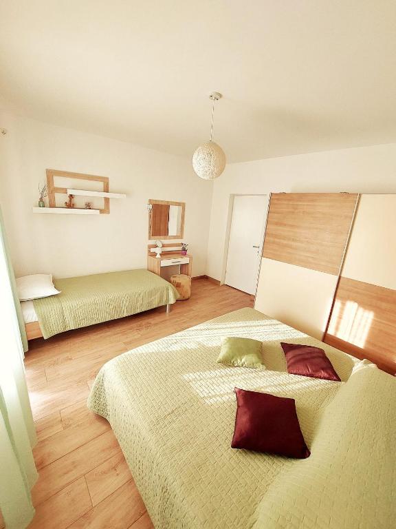 Postel nebo postele na pokoji v ubytování Apartment JeMa