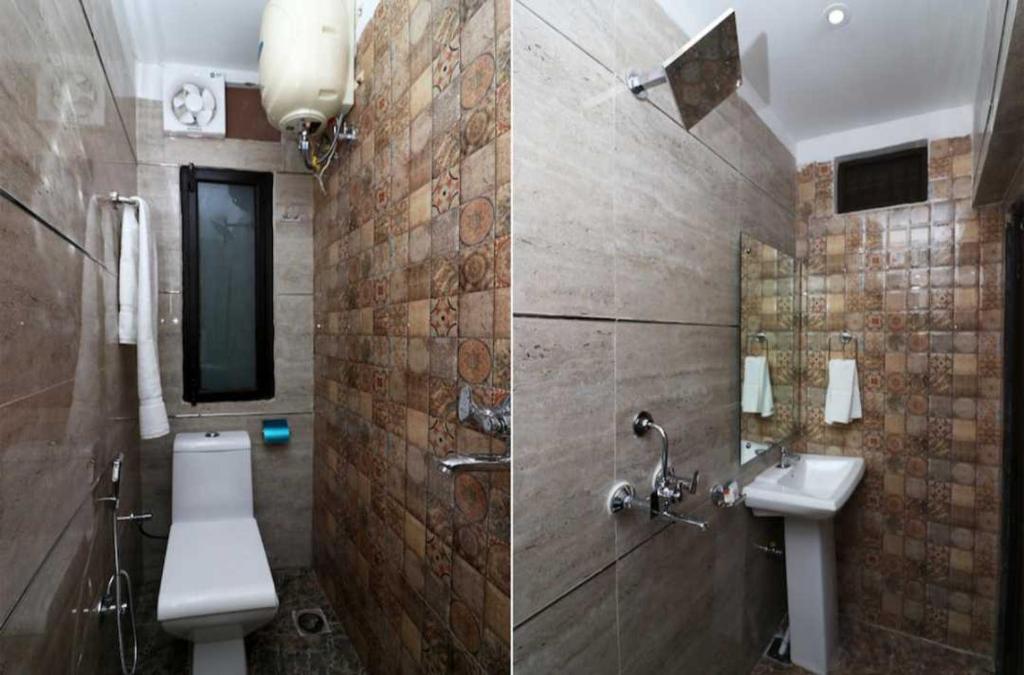 Un baño de SPOT ON Hotel Heaven Inn