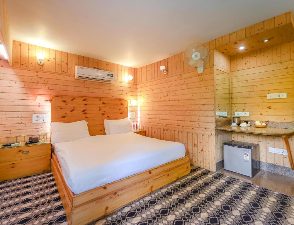 Postel nebo postele na pokoji v ubytování Hotel Mirage