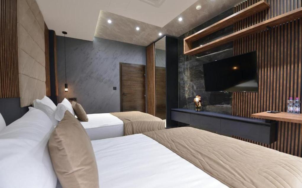Postel nebo postele na pokoji v ubytování Spa Resort & Hotel Vrnjačke Terme