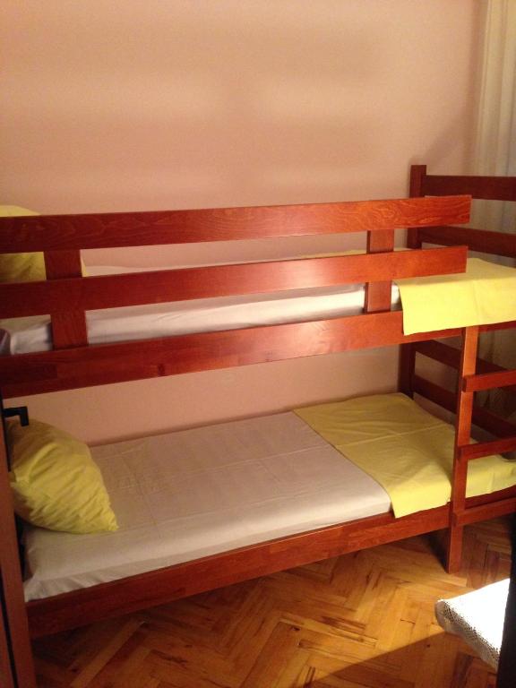 Postel nebo postele na pokoji v ubytování Apartments Aleksic