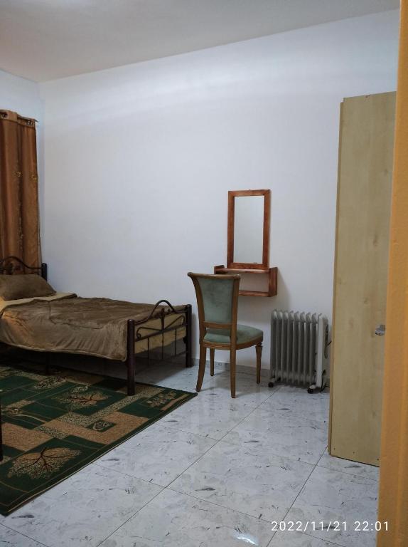 Postel nebo postele na pokoji v ubytování حنضلةHandala Guest House