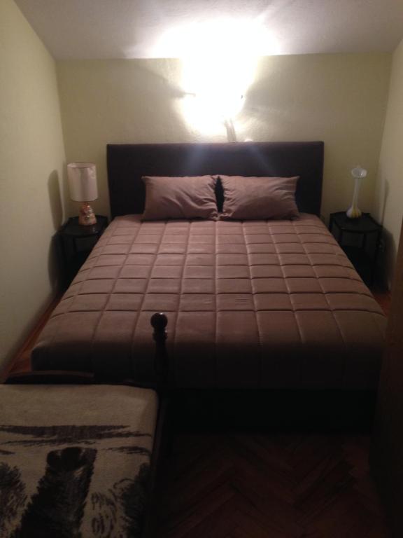 Postel nebo postele na pokoji v ubytování Apartments Aleksic