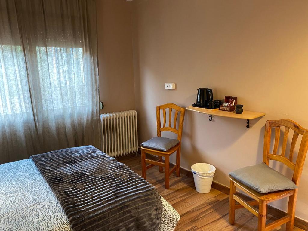 Posteľ alebo postele v izbe v ubytovaní Benvinguts a Casa Nostra