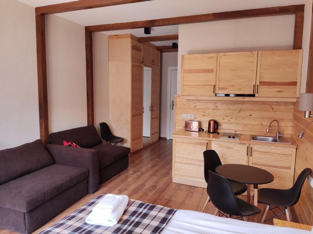 Kuchyň nebo kuchyňský kout v ubytování New Gudauri GoodHost Apartments