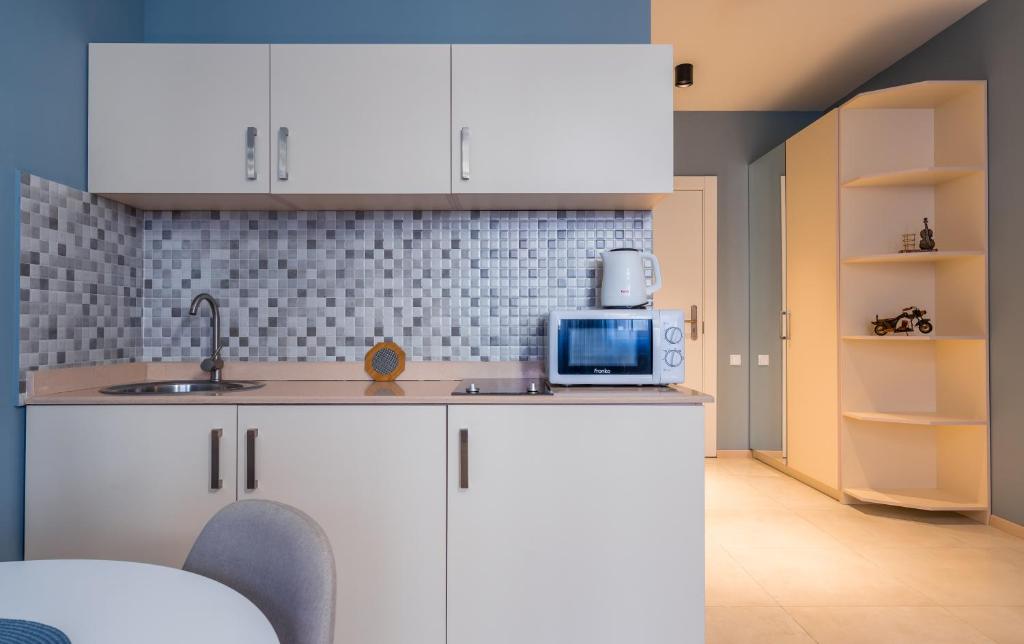Kuchyň nebo kuchyňský kout v ubytování New Gudauri GoodHost Apartments