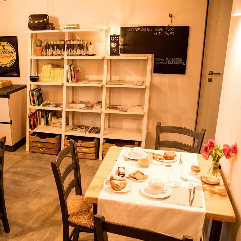 TV a/nebo společenská místnost v ubytování B&B Belelì Daramba