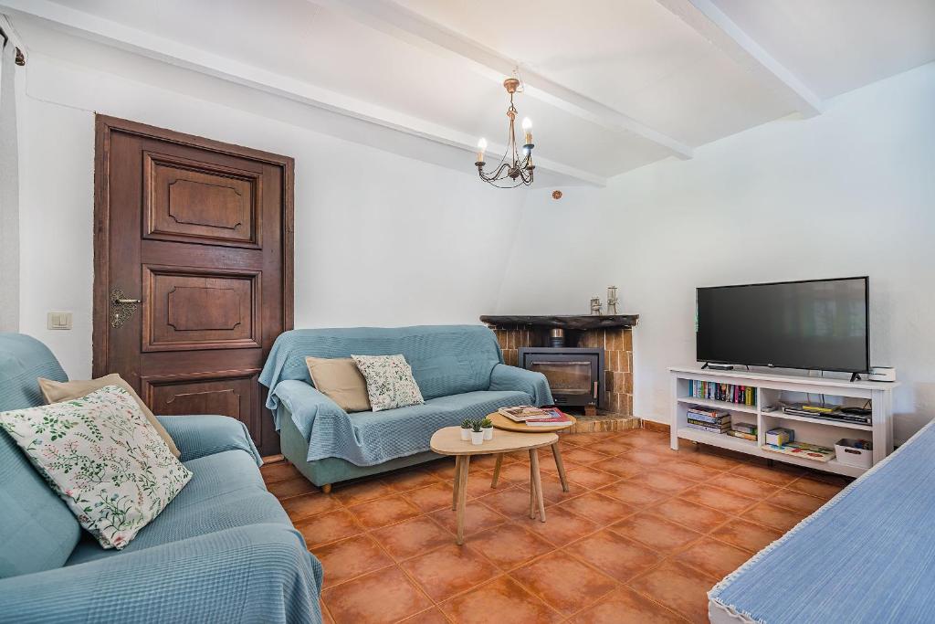 TV a/nebo společenská místnost v ubytování Villa Cati Camp De Lausina