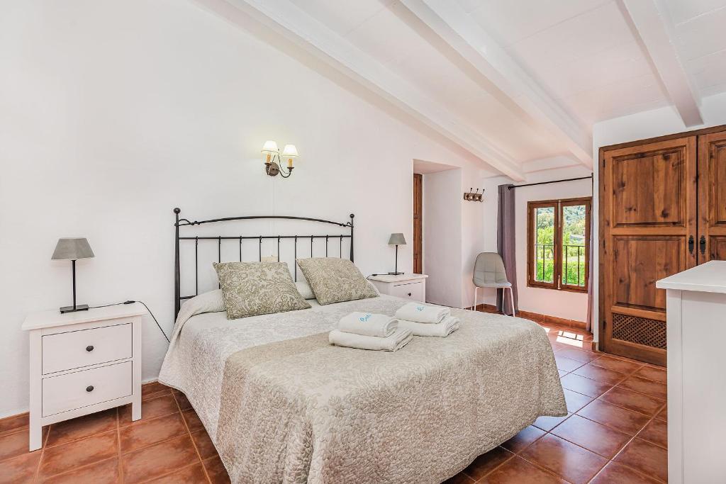 Postel nebo postele na pokoji v ubytování Villa Cati Camp De Lausina