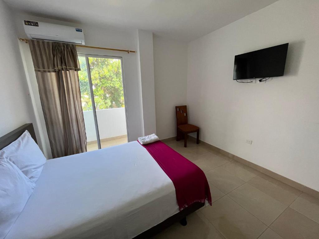 TV a/nebo společenská místnost v ubytování Mare S&M Casa Hostal
