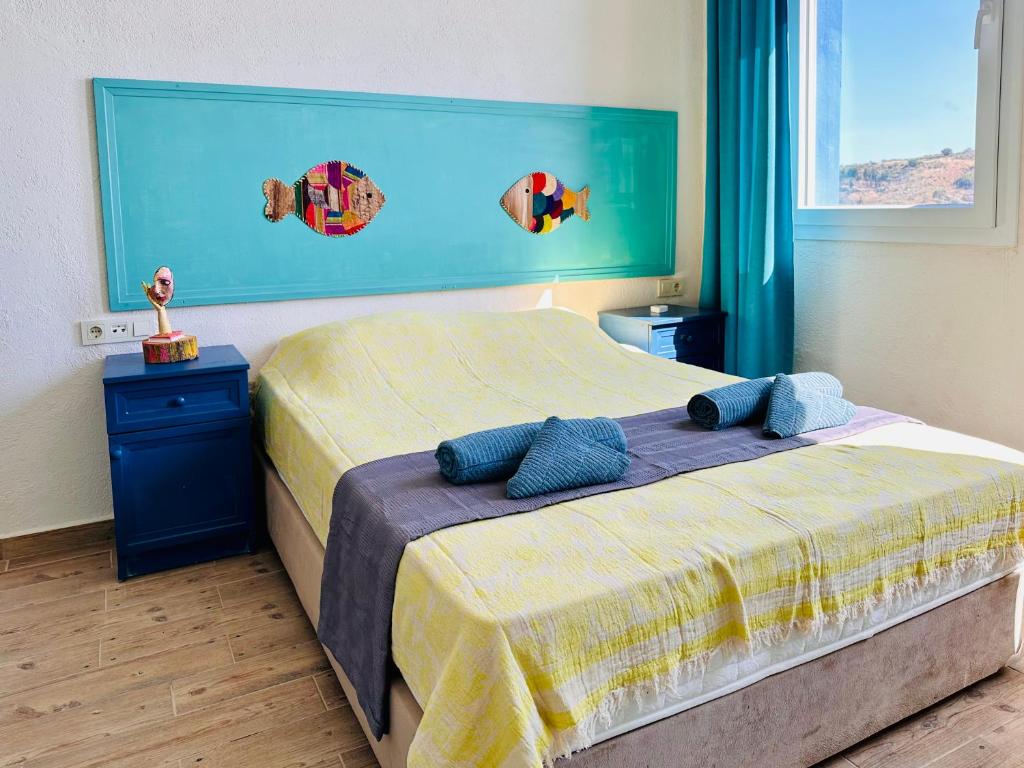 Postel nebo postele na pokoji v ubytování Goknar Knidos Eco Hotel & Farm