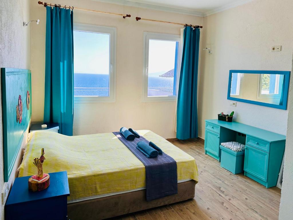 Postel nebo postele na pokoji v ubytování Goknar Knidos Eco Hotel & Farm