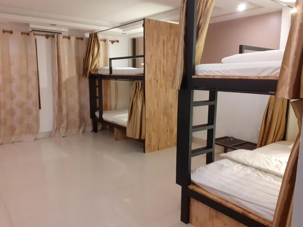 Postel nebo postele na pokoji v ubytování Hoang Thu Hostel