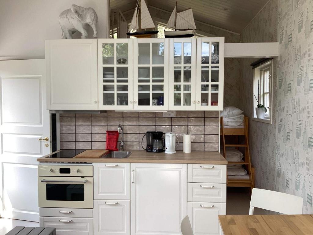 Kuchyň nebo kuchyňský kout v ubytování Holiday home SÖLVESBORG XVI