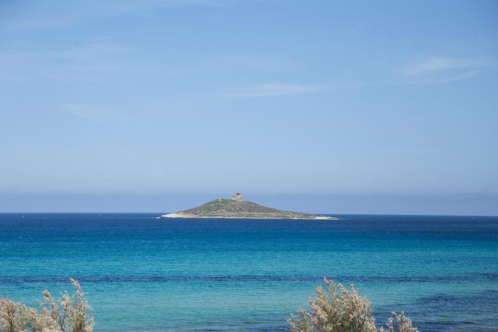 a small island in the middle of the ocean at AR Palace Hotel - Palermo in Isola delle Femmine