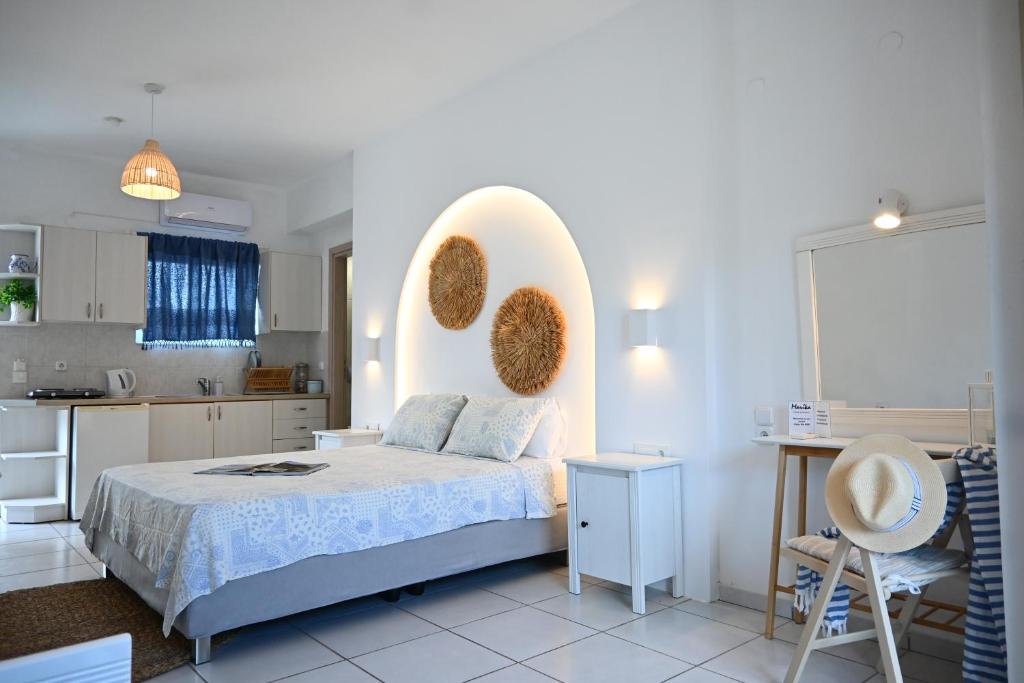 Łóżko lub łóżka w pokoju w obiekcie Marika Studios & Apartments