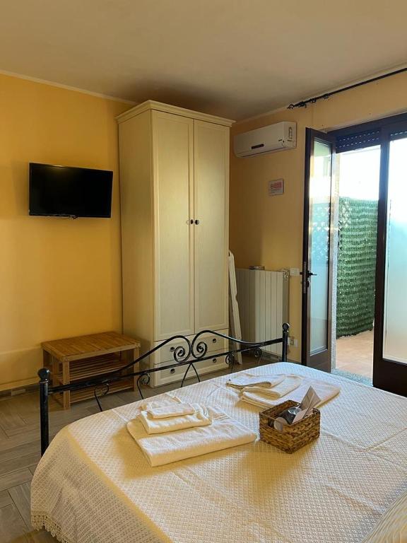 Postel nebo postele na pokoji v ubytování B&B Zio Cici
