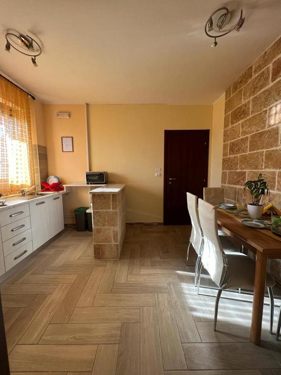 Kuchyň nebo kuchyňský kout v ubytování B&B Zio Cici