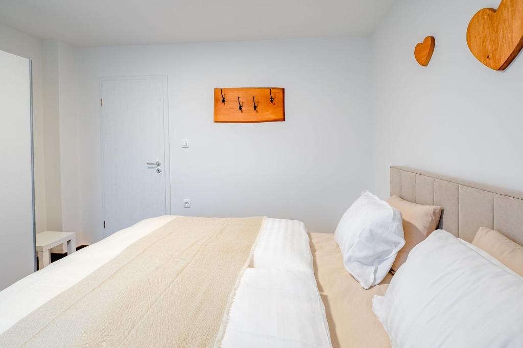 Postel nebo postele na pokoji v ubytování Apartma na hribu