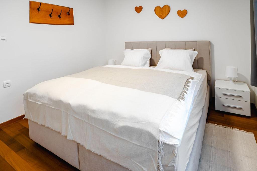 Postel nebo postele na pokoji v ubytování Apartma na hribu