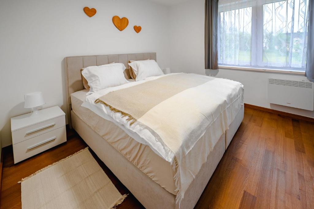Postel nebo postele na pokoji v ubytování Apartma na hribu