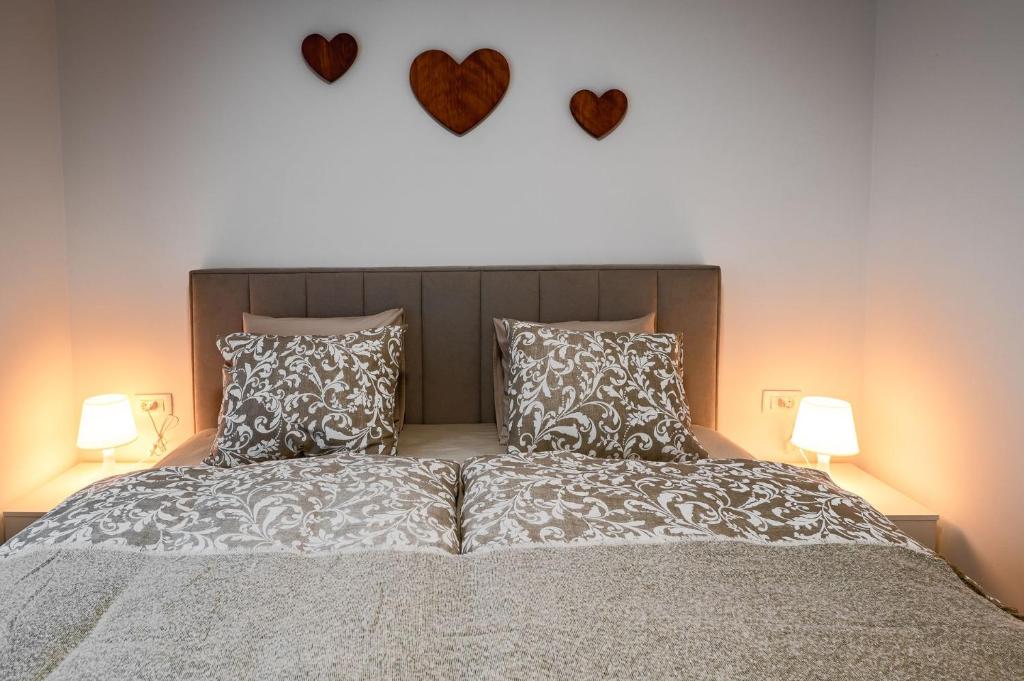 Postel nebo postele na pokoji v ubytování Apartma na hribu