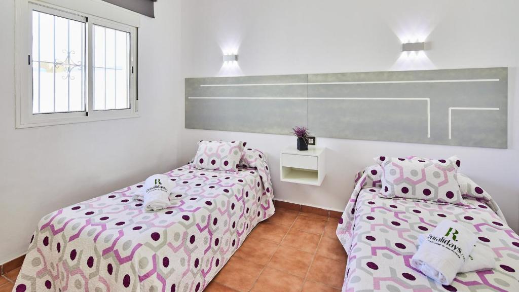 Posteľ alebo postele v izbe v ubytovaní Villa Yuca Conil de la Frontera by Ruralidays