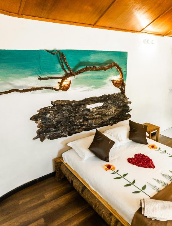 Postel nebo postele na pokoji v ubytování RISING SUN BEACH VIEW