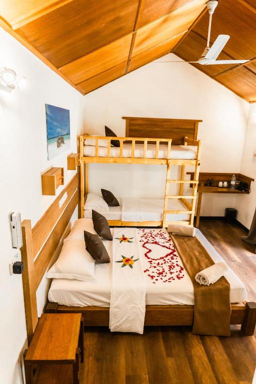 Postel nebo postele na pokoji v ubytování RISING SUN BEACH VIEW