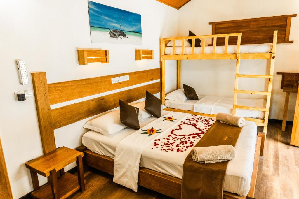 Postel nebo postele na pokoji v ubytování RISING SUN BEACH VIEW