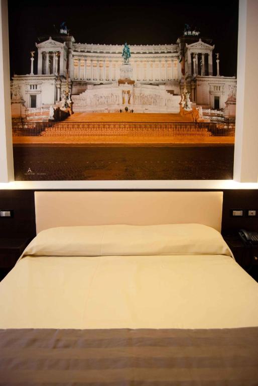 Postel nebo postele na pokoji v ubytování Hotel Star