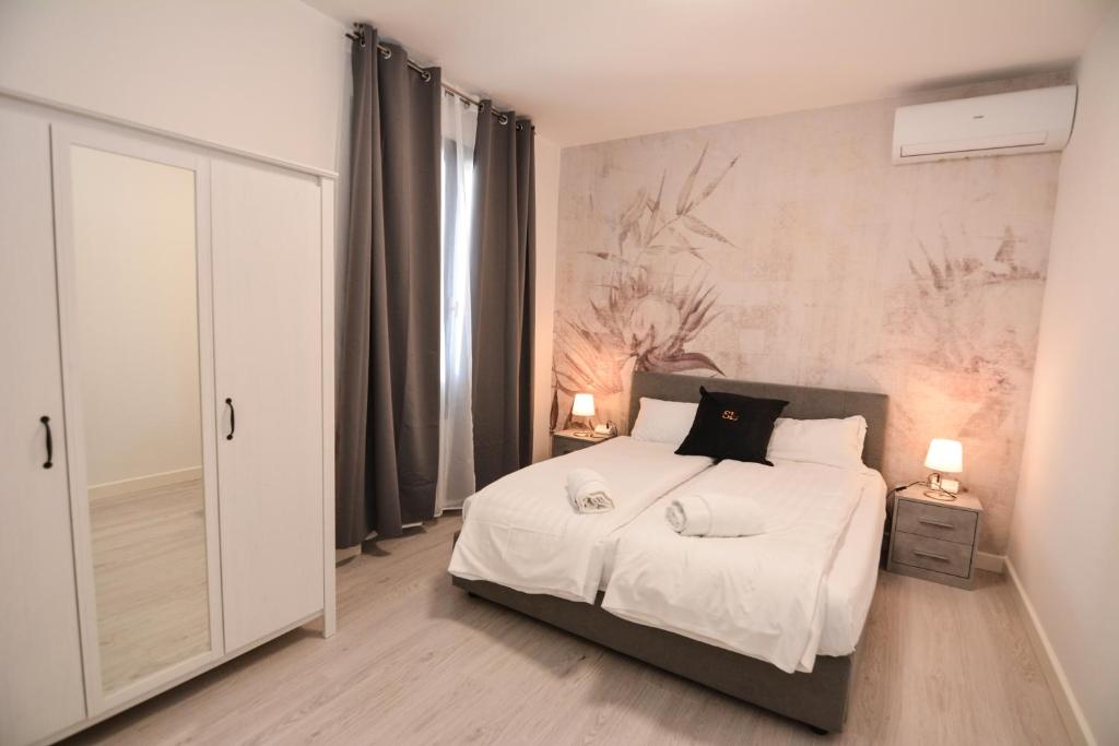 Postel nebo postele na pokoji v ubytování Sunset Lodge - ENJOY HOLIDAY