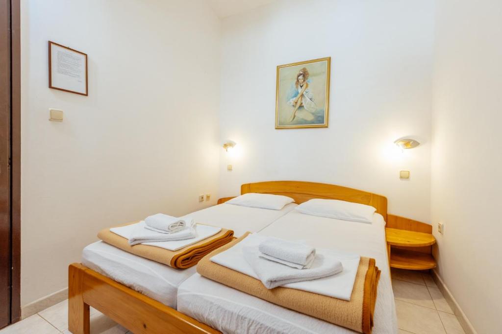 Postel nebo postele na pokoji v ubytování Radic Rooms