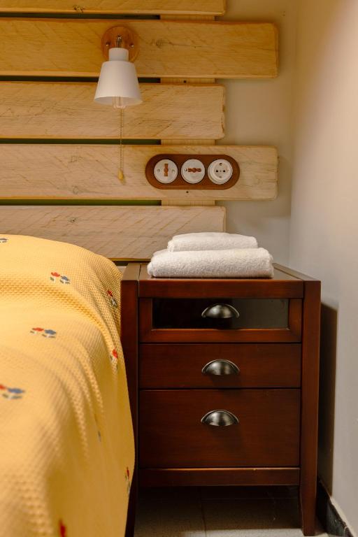 Postel nebo postele na pokoji v ubytování El Petit Estudi - Els Apartaments del Bosc
