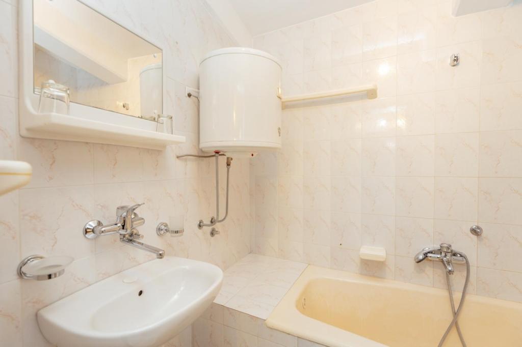 Koupelna v ubytování Radic Rooms