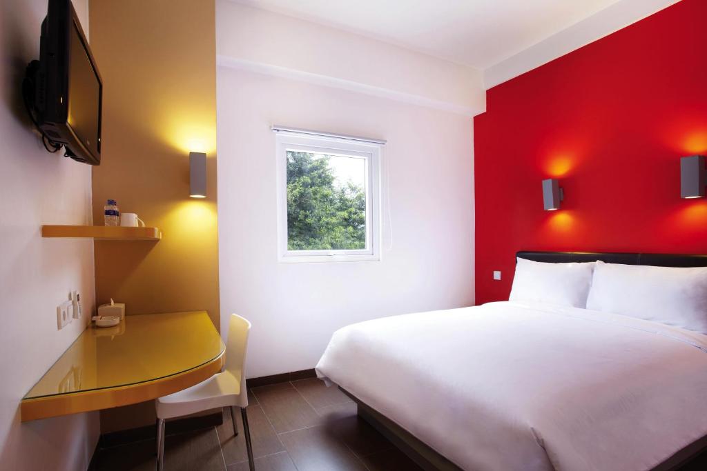 TV a/nebo společenská místnost v ubytování Amaris Hotel Madiun