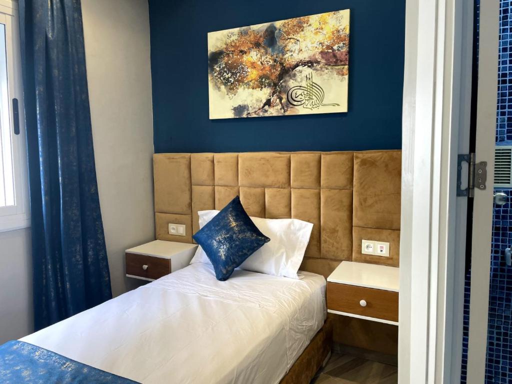 Cama o camas de una habitación en HOSTAL MH BORJ