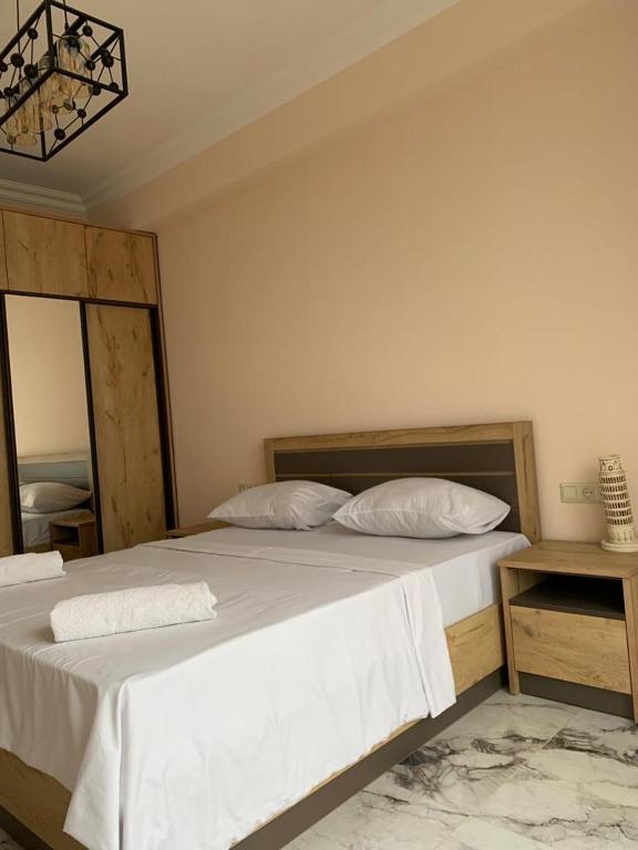 Postel nebo postele na pokoji v ubytování Luxury Apartment with balcony