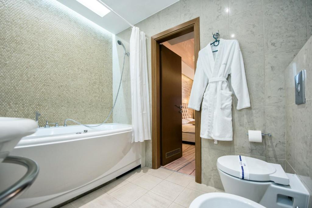 Koupelna v ubytování Hotel Palladium