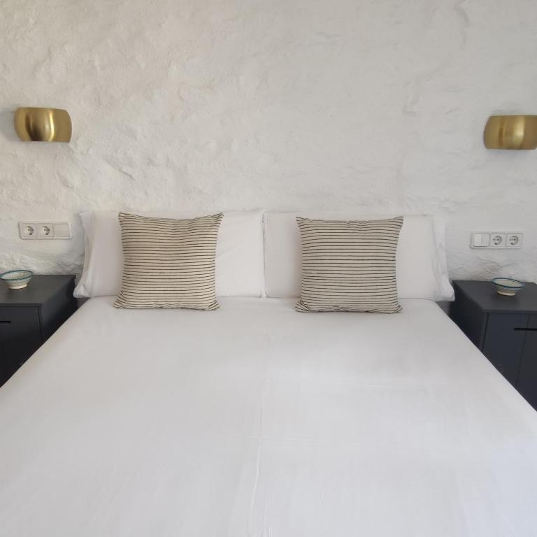 Postel nebo postele na pokoji v ubytování Hostal Blavet