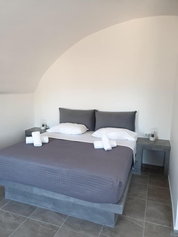 Postel nebo postele na pokoji v ubytování ILIADA-ODYSSEAS RESORT