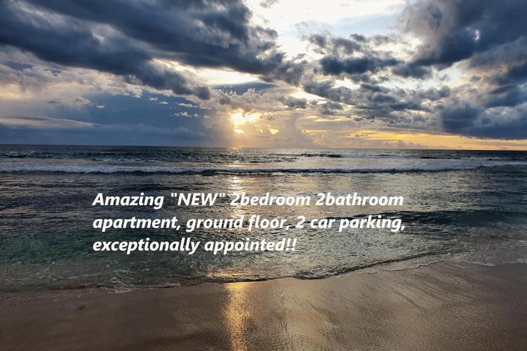 una imagen de una playa con puesta de sol en Amazing 2bedbath Apartment 1min To The Beach, en Perth