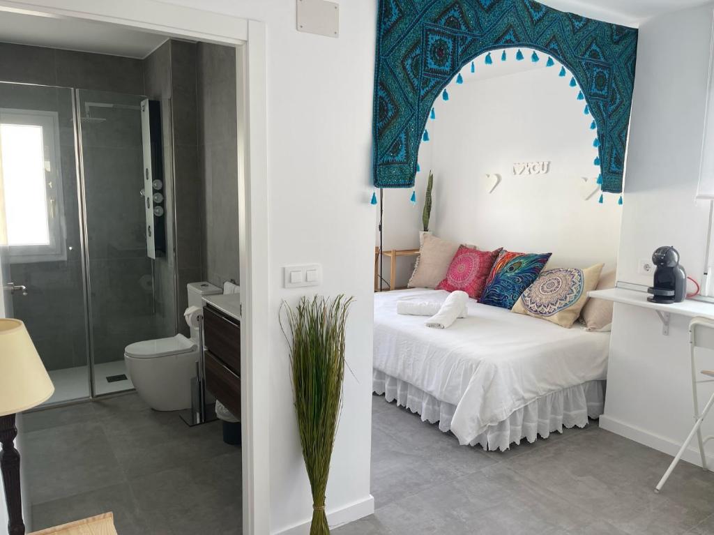 Postel nebo postele na pokoji v ubytování Levante by Mintaka Homes