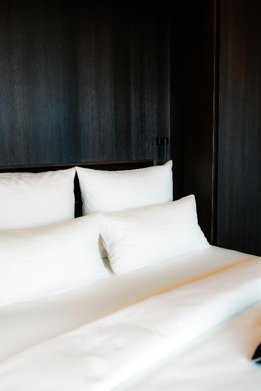 Postel nebo postele na pokoji v ubytování SOLLER Business Hotel - Munich Airport MUC