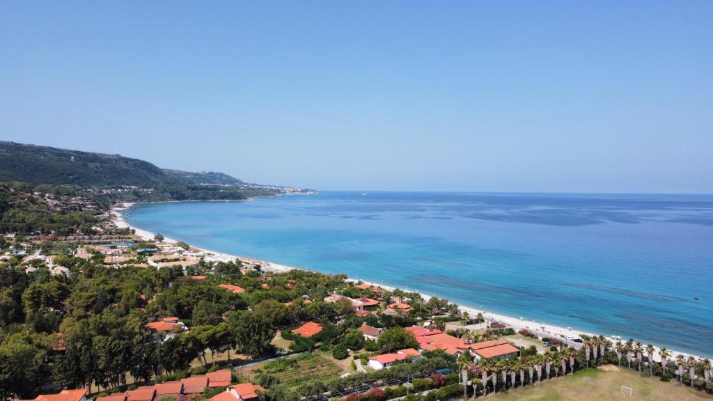 an aerial view of a beach and the ocean at Hotel La Giara in Zambrone
