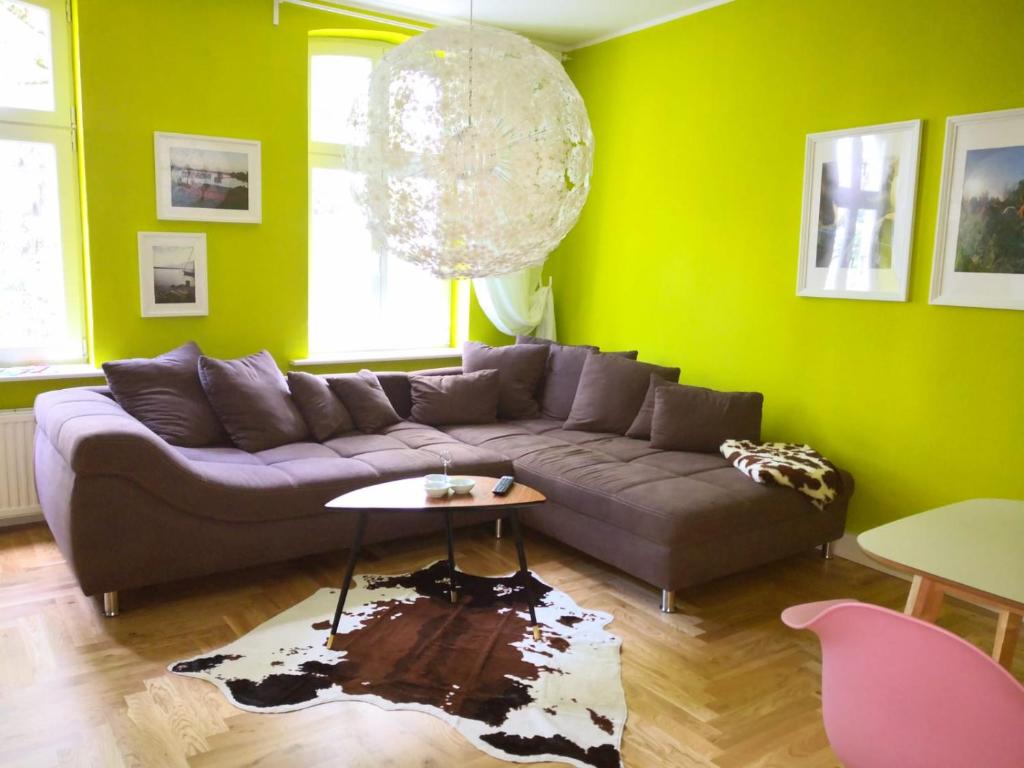 a living room with a couch and a table at Anna in Anklam