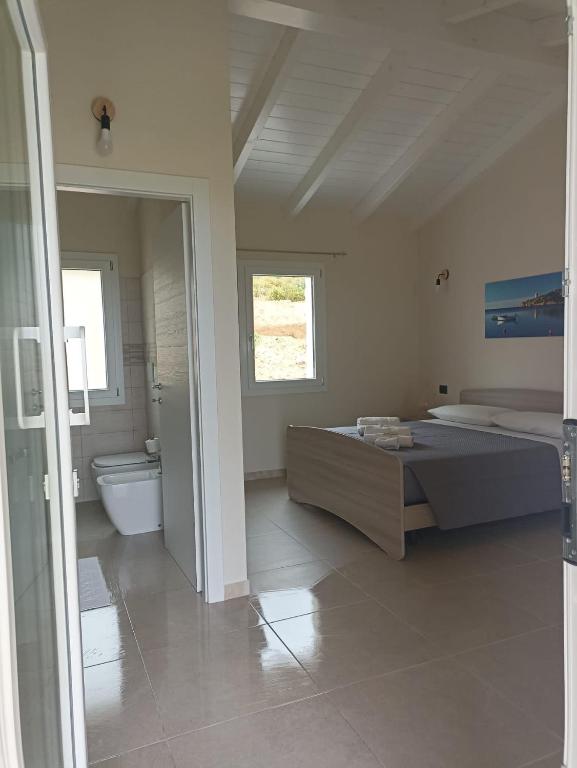 Vannituba majutusasutuses Is Arenas Biancas Agriturismo