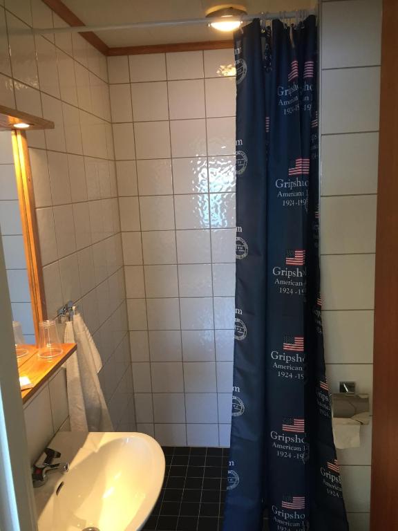 Koupelna v ubytování Hotell Fisketången